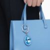 Schlüsselanhänger mit ovalem Schliff, blau, Metall-Mix-Finish