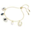 Symbolica-Armband mit Kristallperle, Kleeblatt, bösem Blick und Hufeisen, blau, vergoldet Symbolica-Armband mit Kristallperle, Kleeblatt, bösem Blick und Hufeisen, blau, vergoldet